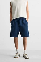 BERMUDA DE JOGGING COUTURES