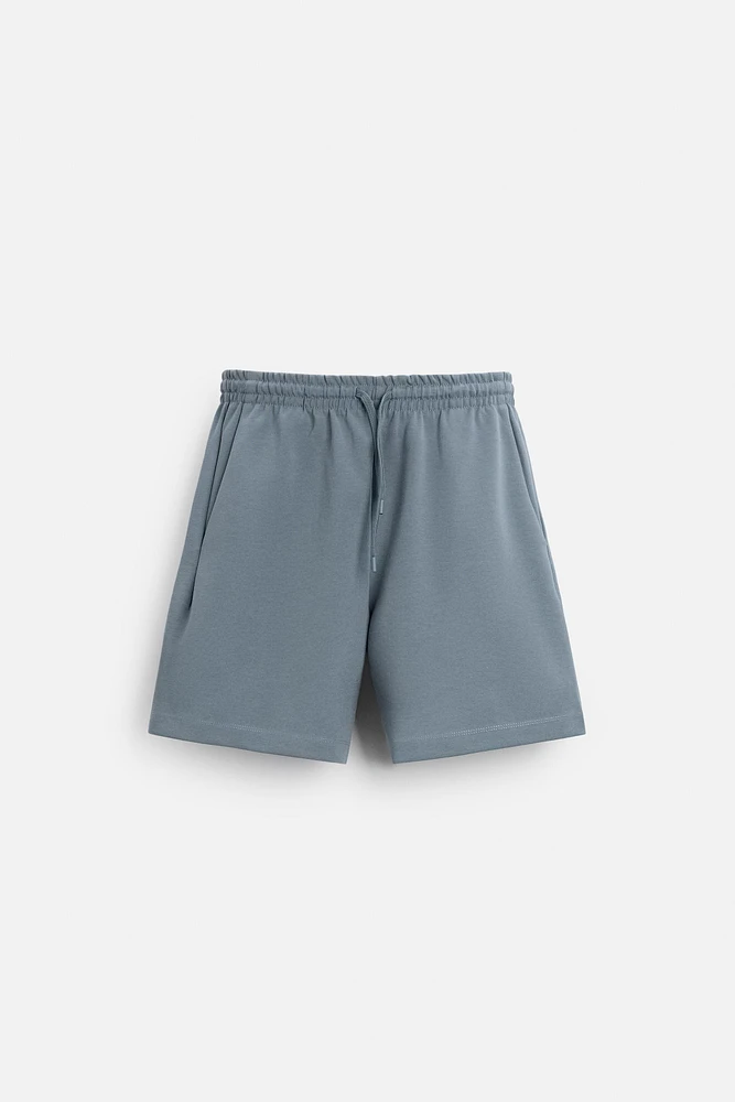 INTERLOCK STRUCTURED SHORTS