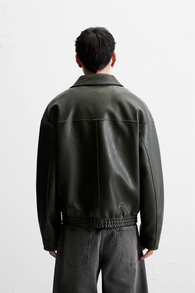 BLOUSON GRAVÉ EN CUIR SYNTHÉTIQUE