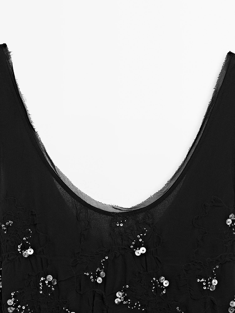 Long dress with beading