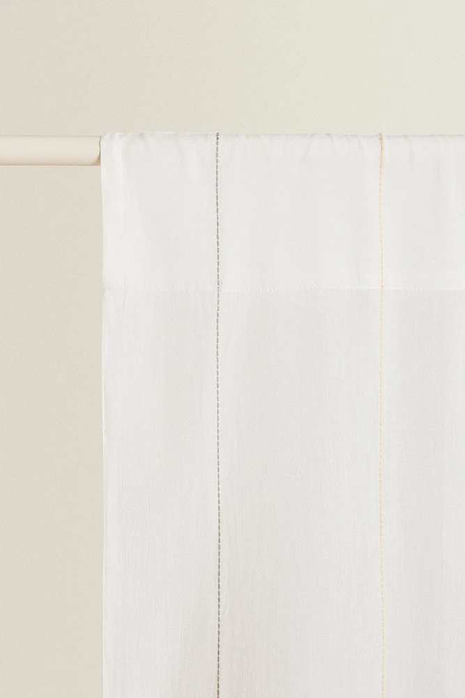 LOW OPACITY TASSEL CURTAIN