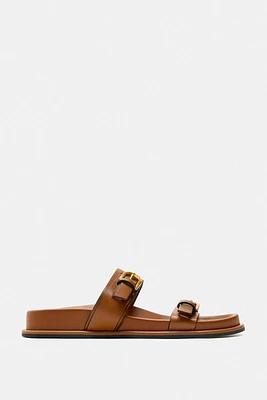 BUCKLED SANDALS