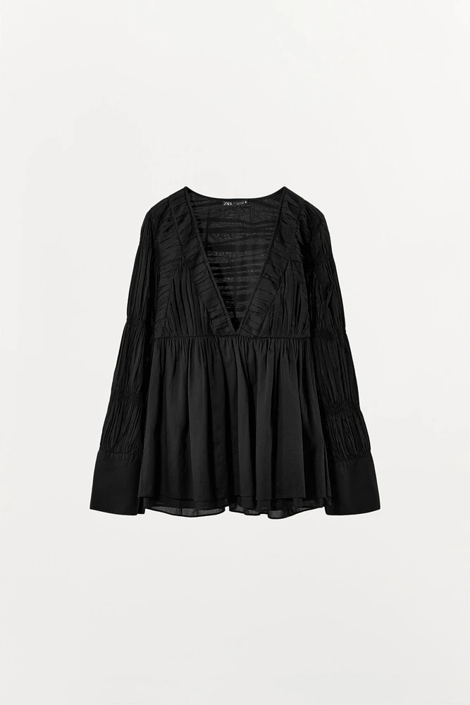 BLOUSE ÉLASTIQUE PLISSÉE