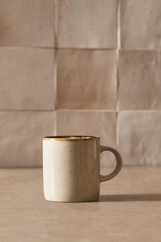 PORCELAIN MUG WITH ANTIQUE FINISH RIM