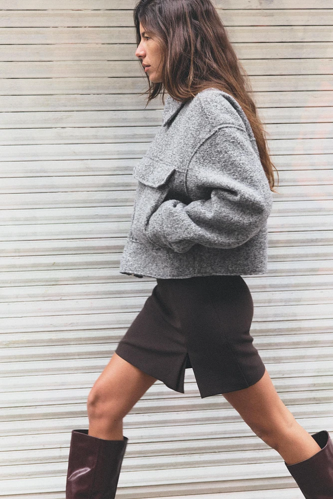 VESTE COURTE BOUCLÉE