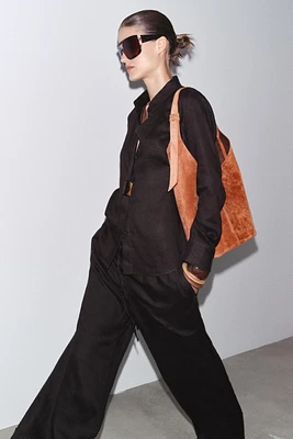 MAXI SAC SEAU EN CUIR DÉTAIL ANSE