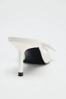 LEATHER BOW HEELED SANDALS