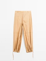 Lightweight trousers with strap details - Studio