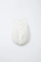 TEXTURED FLORAL ROMPER