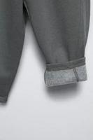 SEAMED PANTS WITH LABEL DETAIL