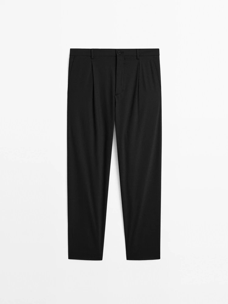 Relaxed fit trousers with darts
