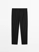 Relaxed fit trousers with darts