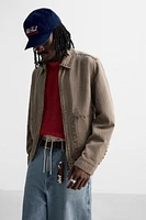 VESTE DÉLAVÉE CLOUS