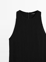 Textured knit dress with fringed hem