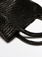 Sac mi-tote tressé en cuir nappa