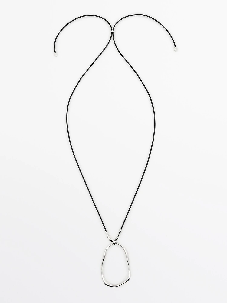 Leather cord necklace with asymmetric piece