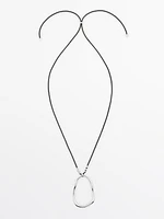 Leather cord necklace with asymmetric piece