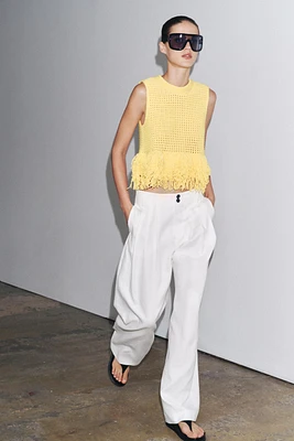 TOP EN MAILLE QUADRILLÉ À FRANGES