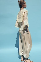 BLOUSE EN MAILLE POINTELLE À VOLANTS