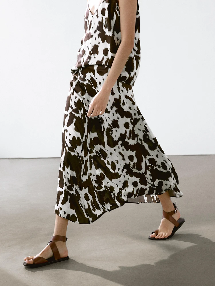 Flowing strappy animal print top