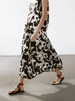 Flowing strappy animal print top