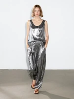 Flowing metallic trousers with gathered detail
