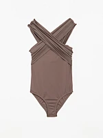 Bandeau swimsuit with criss-cross straps