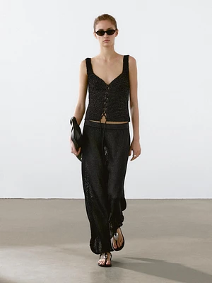 Jupe midi en maille ajourée