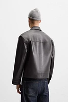 BLOUSON EN CUIR À POCHES