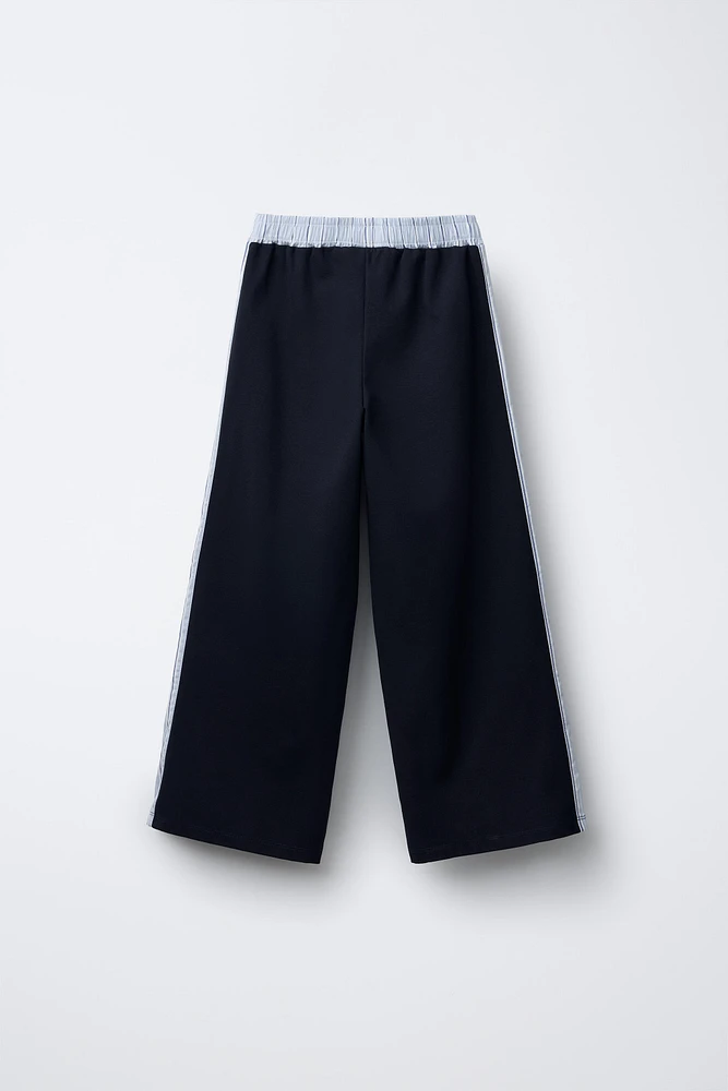 PANTALON JAMBES LARGES À BANDES RAYÉES