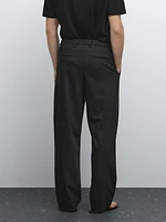 Relaxed fit trousers with darts