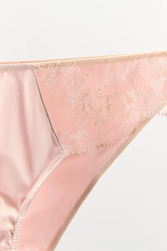 CULOTTE EN MATIÈRES VARIÉES BRODÉES