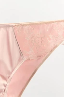 CULOTTE EN MATIÈRES VARIÉES BRODÉES