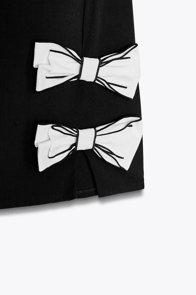 ROBE COURTE LACETS