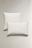 HOUSSE DE COUSSIN NŒUDS