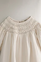 ROBE ENFANT NID D’ABEILLE