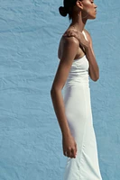 ROBE MI-LONGUE ASYMÉTRIQUE
