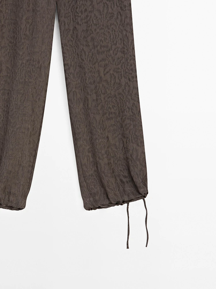 Flowing wide-leg jacquard trousers