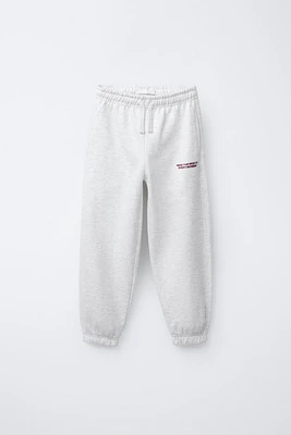 PLUSH RAISED TEXT JOGGER PANTS