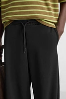 PANTALON WIDE FIT STRUCTURE INTERLOCK