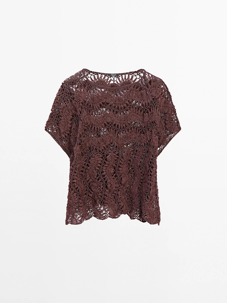 Cape en maille ajourée crochetée