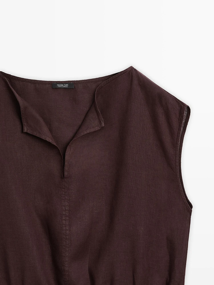 Linen blouse with elasticated hem
