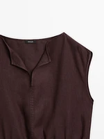 Linen blouse with elasticated hem