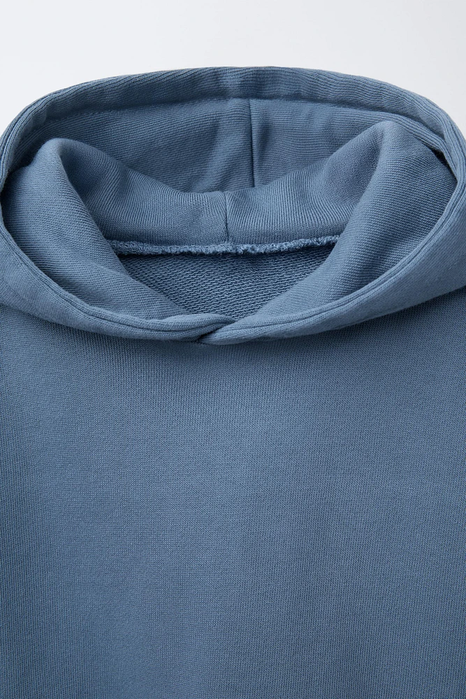 GILET À CAPUCHE LOGO