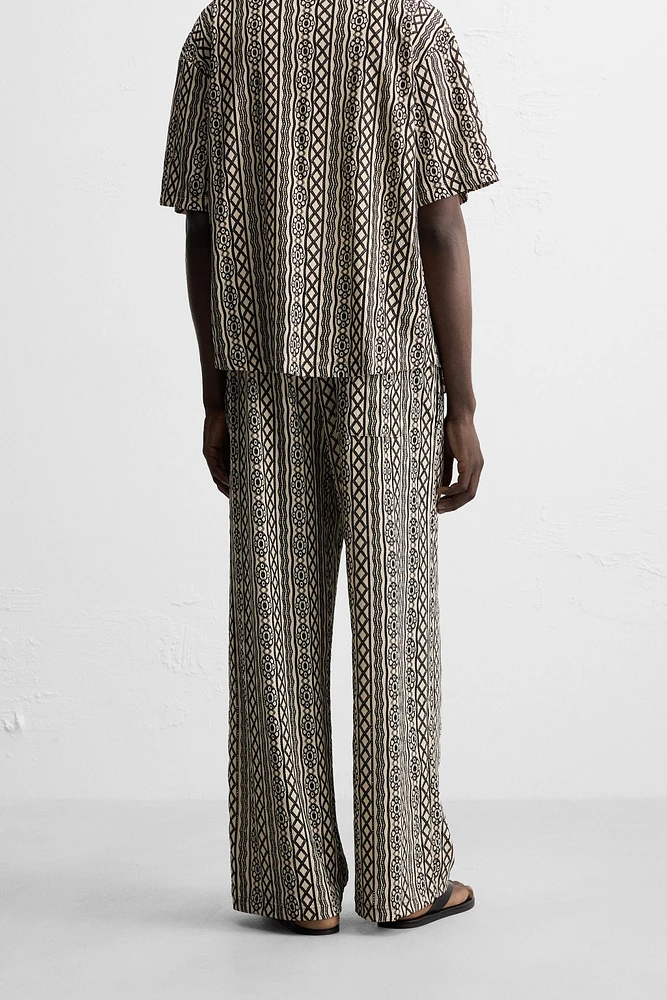 PERFORATED JACQUARD RELAXED FIT PANTS