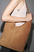 SAC SEAU SOFT ASYMÉTRIQUE EN CROÛTE DE CUIR