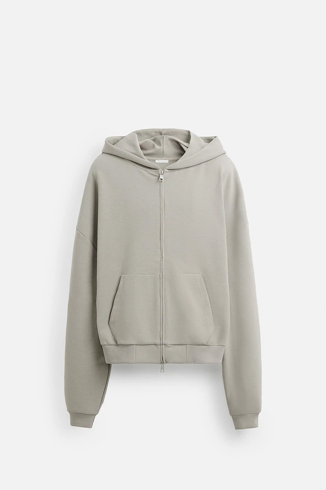 SWEAT BOX FIT CAPUCHE TECHNIQUE