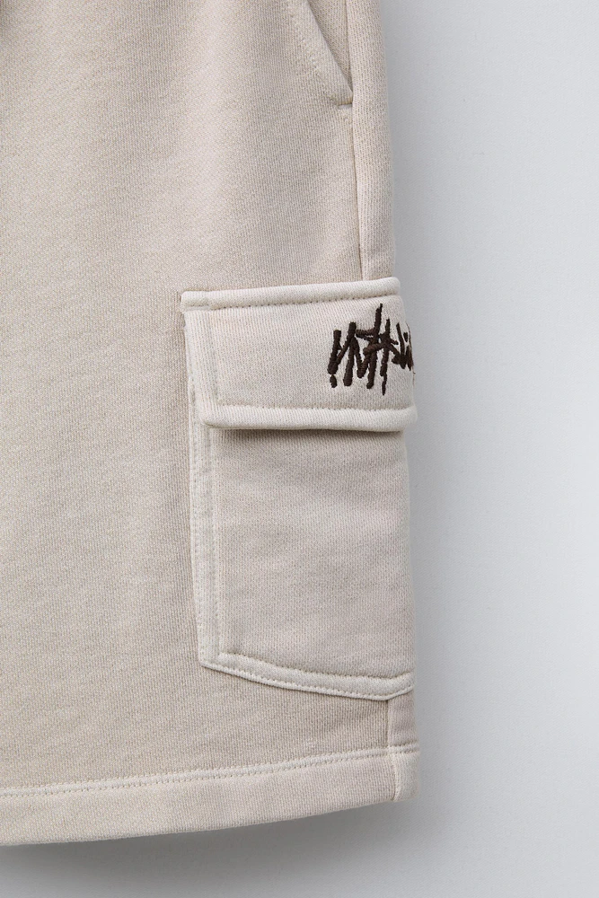 GRAFFITI CARGO PLUSH SHORTS