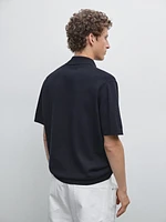 Polo en maille de coton à col zippé