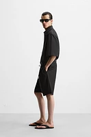 PLEATED COTTON LINEN SHORTS